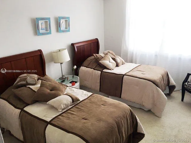 a bed room with a bed and a couch