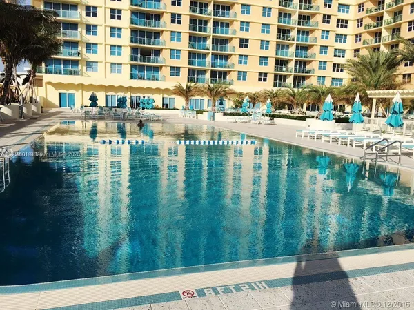 a balcony with swimming pool