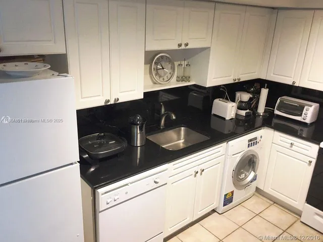 a close view of utility and kitchen appliances