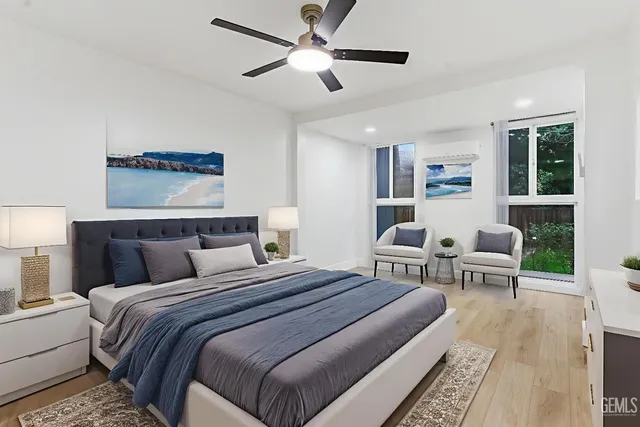 a bedroom with a bed and a couch