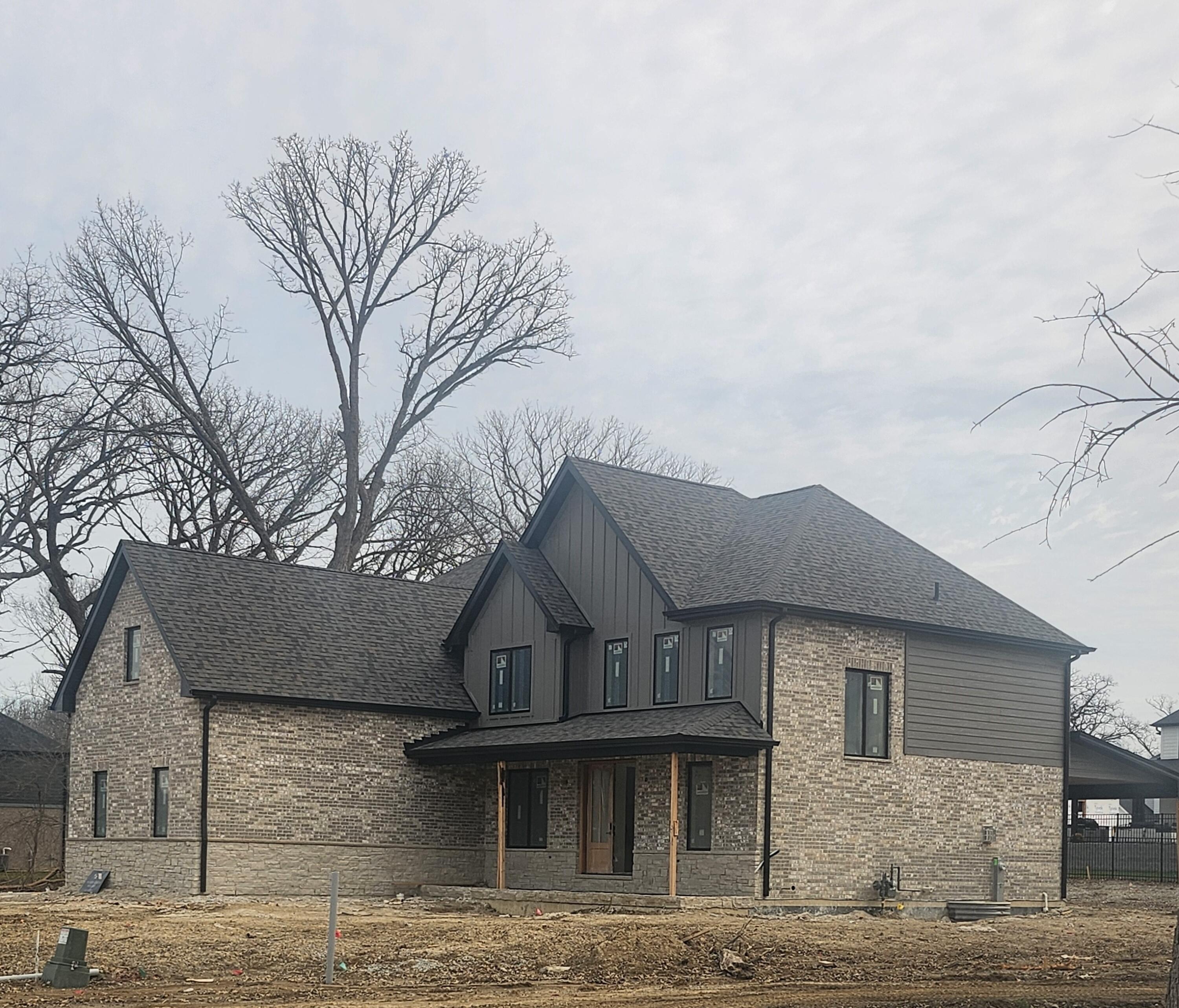 9631 Sweetspire Avenue St. John, IN 46373 - Photo 1 of 1 a front view of a house with garden