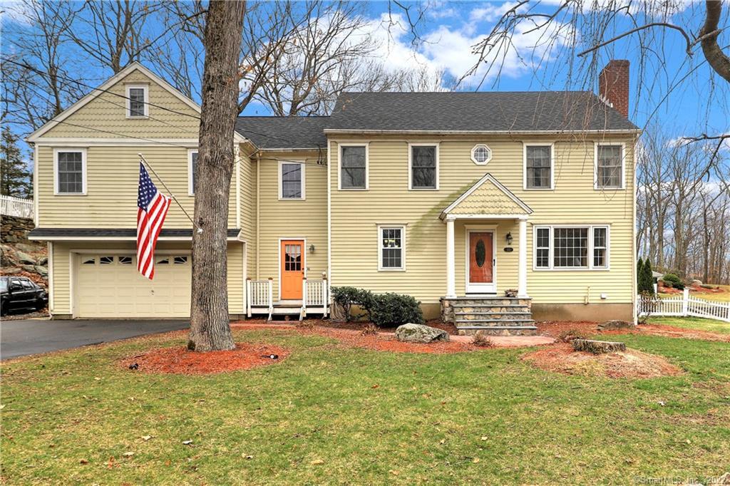 132 Mohegan Road Shelton, CT 06484 - Photo 1 of 1 a front view of a house with a yard