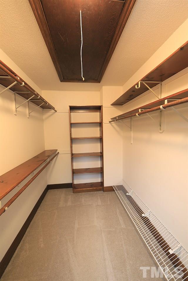 122 Skylark Way Raleigh, NC 27615 - Photo 19 of 30 a view of room with racks on the wall