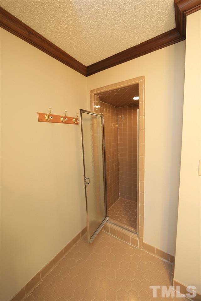 122 Skylark Way Raleigh, NC 27615 - Photo 22 of 30 a bathroom with a shower and a sink