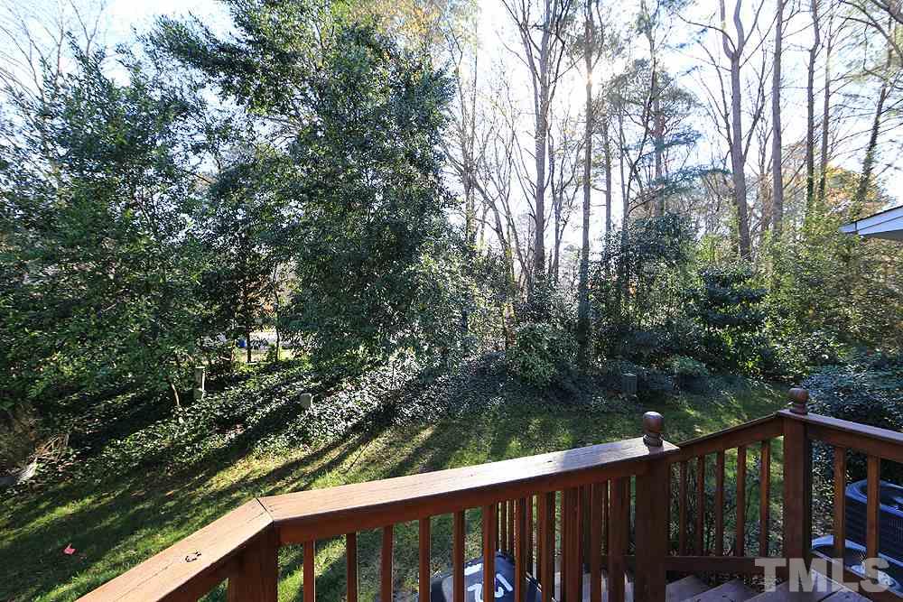 122 Skylark Way Raleigh, NC 27615 - Photo 28 of 30 a view of a wooden fence
