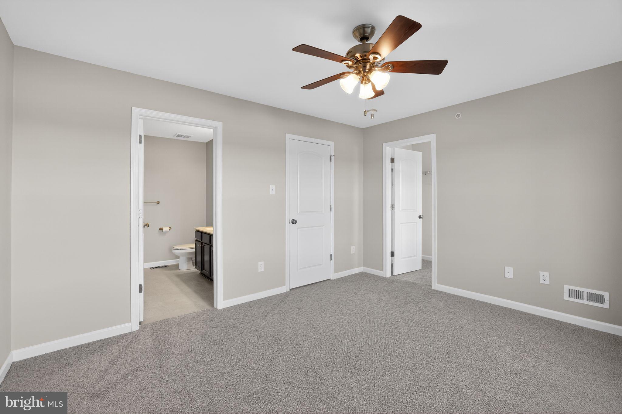 3669 Jacob Stout Road, Unit 8 Doylestown, PA 18902 - Photo 15 of 34 a view of a livingroom with a ceiling fan