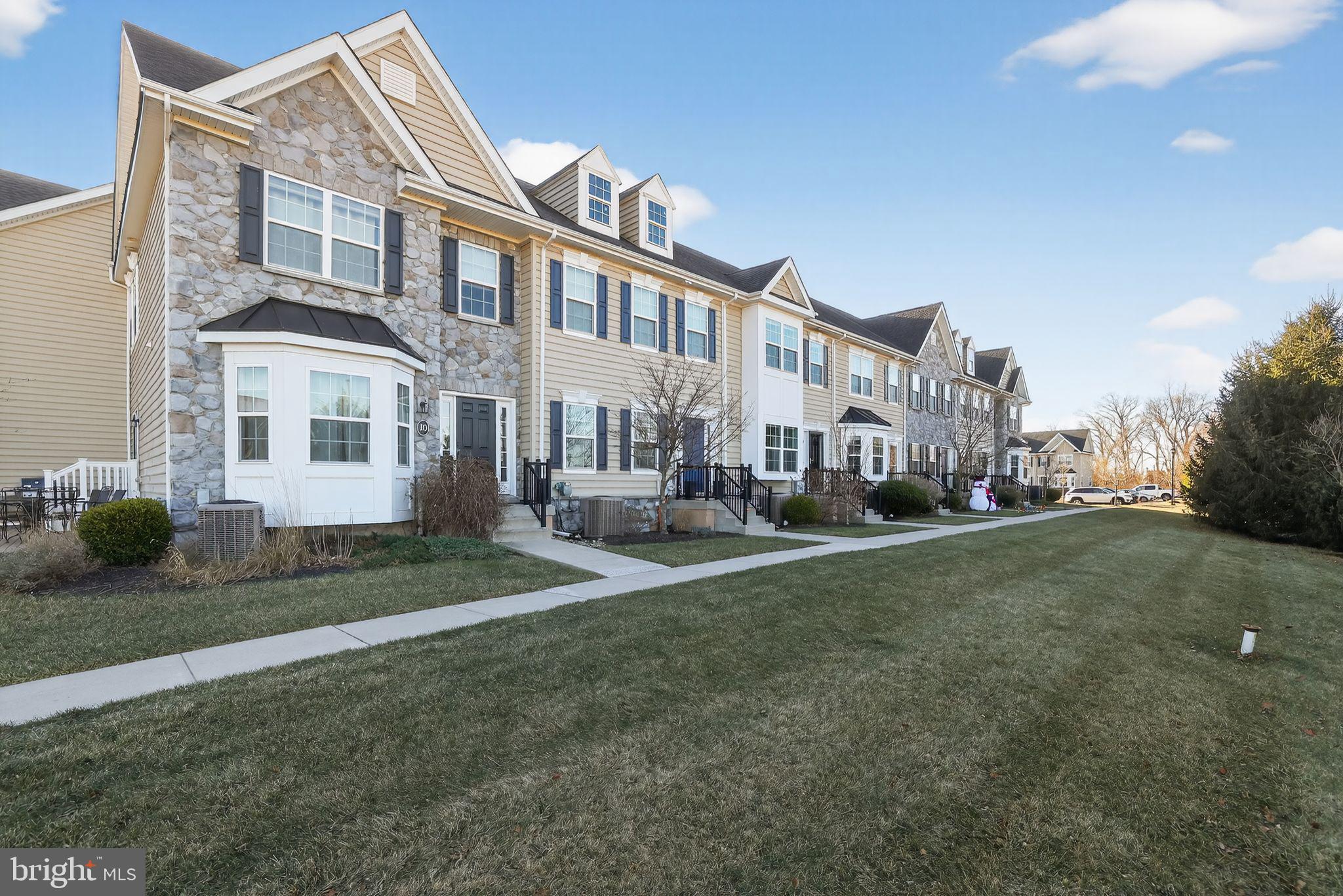 3669 Jacob Stout Road, Unit 8 Doylestown, PA 18902 - Photo 2 of 34 a view of a big room with a yard