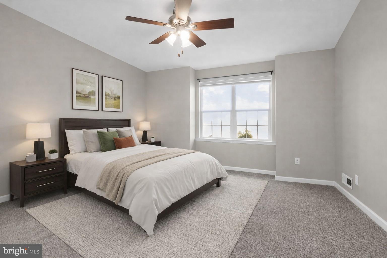 3669 Jacob Stout Road, Unit 8 Doylestown, PA 18902 - Photo 23 of 34 a bedroom with a large bed and two window