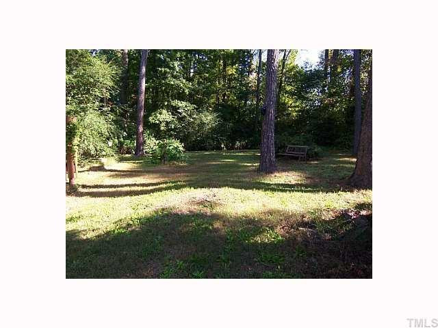 3616 Star Trek Court Raleigh, NC 27604 - Photo 11 of 12 Large wooded private lot with only neighbor to the right, and that neighbor keeps theirs looking good!!! Back Yard