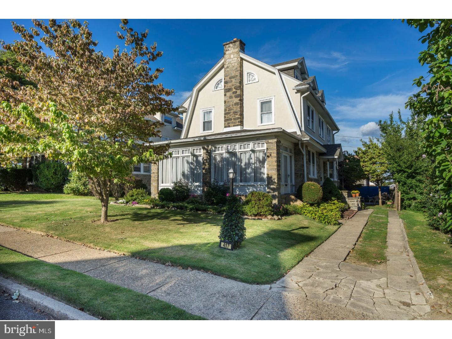 417 Netherwood Road Upper Darby, PA 19082 - Photo 1 of 24 a front view of a house with garden and trees