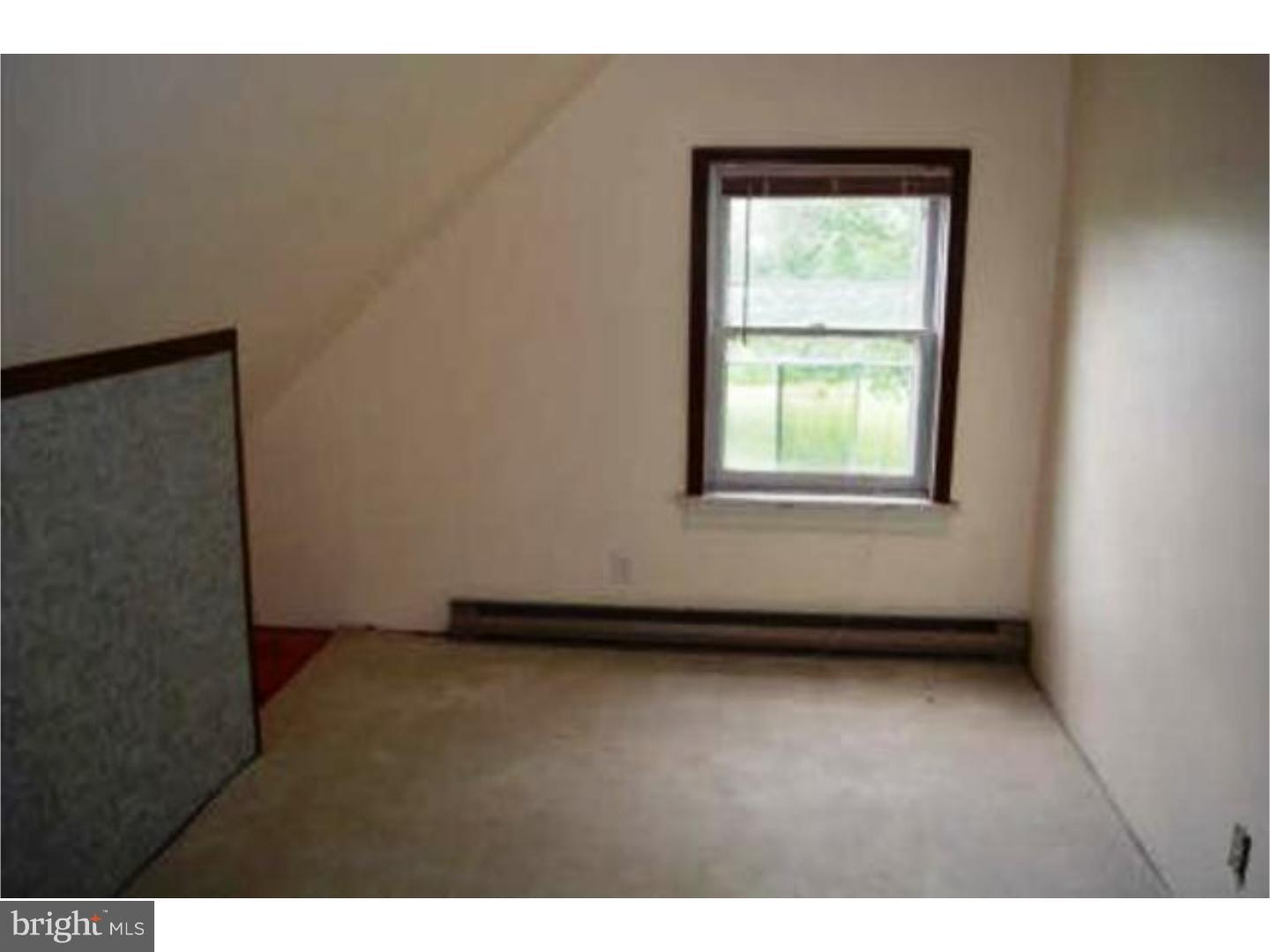 262 West Ridge Road Nottingham, PA 19362 - Photo 6 of 9 a view of an empty room with a window