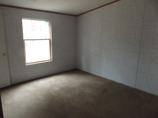 279 Migrant Camp Road Batesburg, SC 29006 - Photo 16 of 19 an empty room with a window