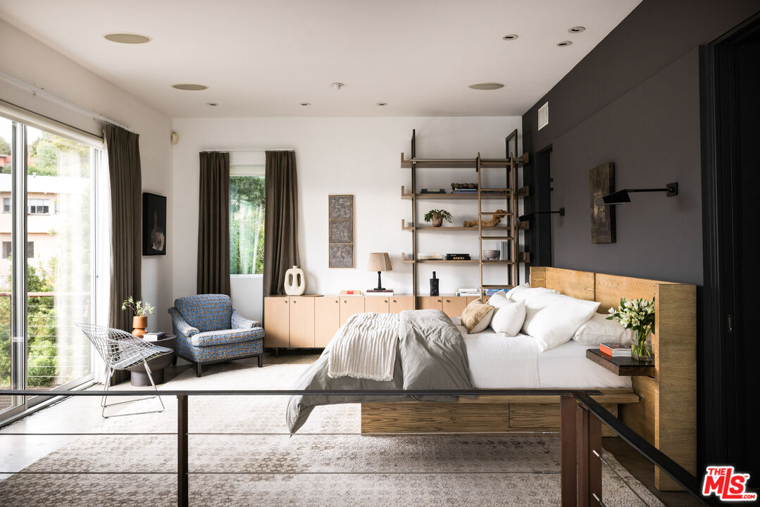 3103 Hamilton Way Los Angeles, CA 90026 - Photo 14 of 36 a bedroom with furniture and a large window