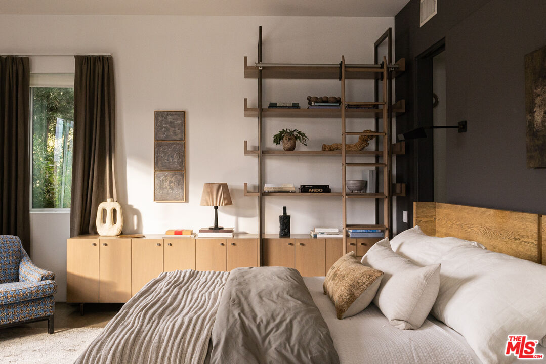 3103 Hamilton Way Los Angeles, CA 90026 - Photo 15 of 36 a bedroom with a bed and a window