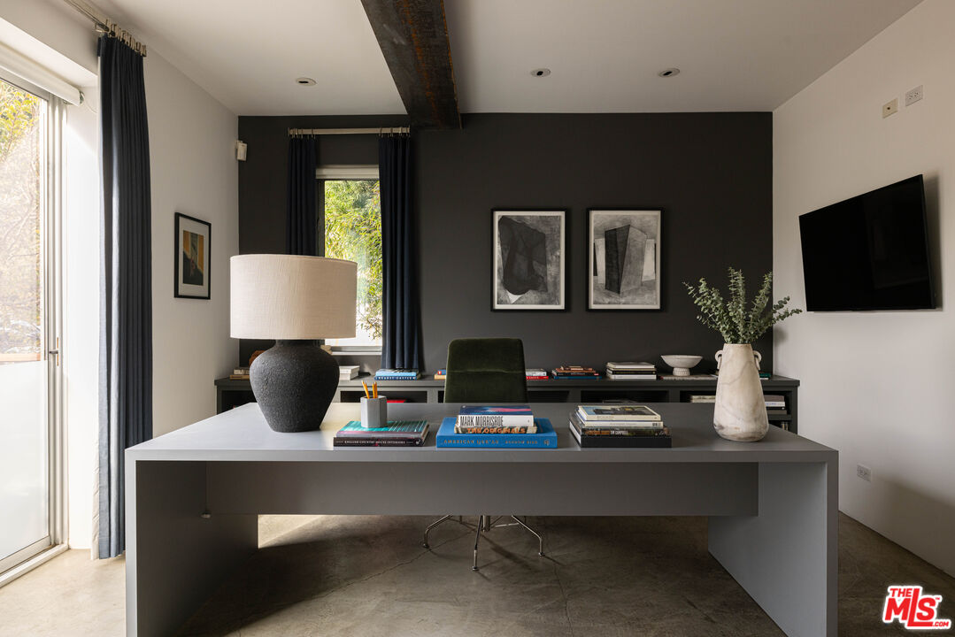 3103 Hamilton Way Los Angeles, CA 90026 - Photo 25 of 36 a living room with furniture a flat screen tv and kitchen view