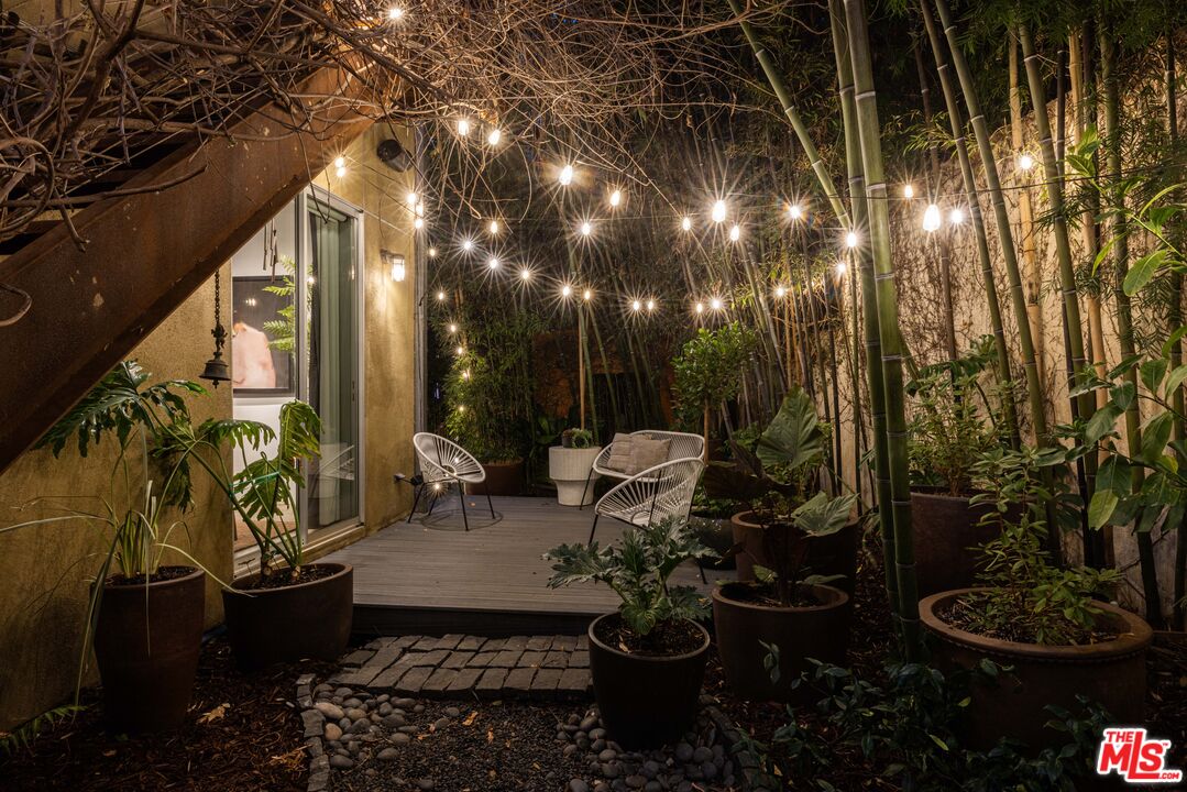 3103 Hamilton Way Los Angeles, CA 90026 - Photo 32 of 36 a living room with patio furniture and potted plants