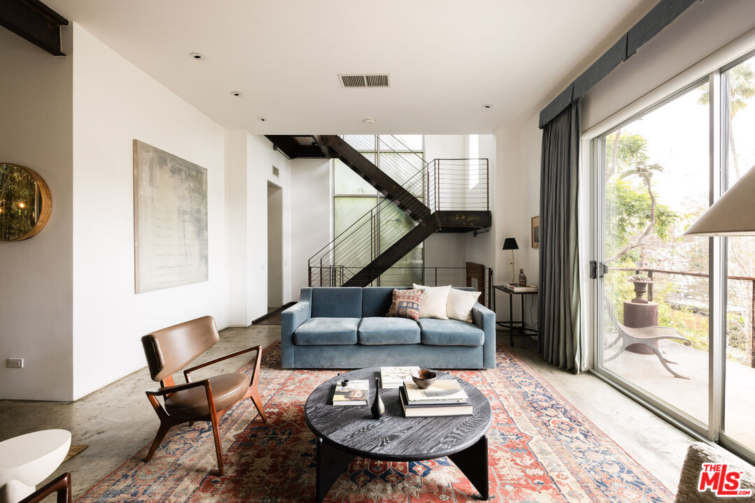 3103 Hamilton Way Los Angeles, CA 90026 - Photo 4 of 36 a living room with furniture and a large window