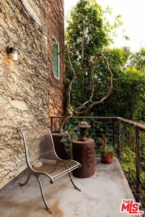 3103 Hamilton Way Los Angeles, CA 90026 - Photo 5 of 36 a view of a chair and table in the balcony
