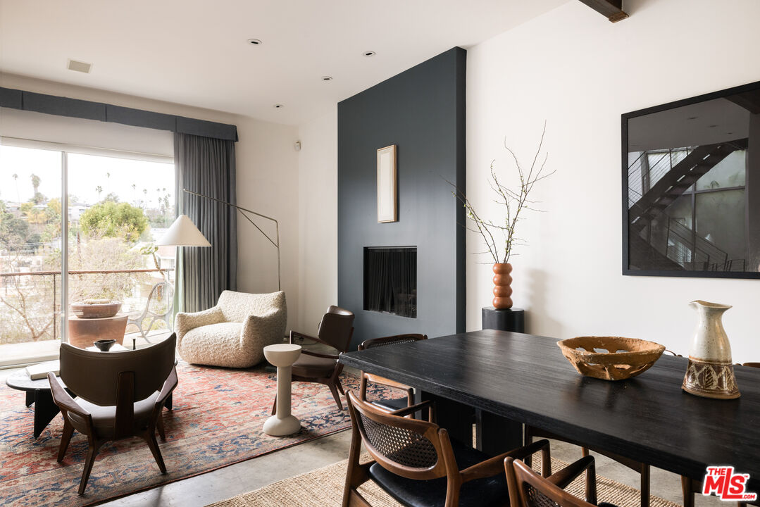 3103 Hamilton Way Los Angeles, CA 90026 - Photo 7 of 36 a view of a dining room with furniture and wooden floor