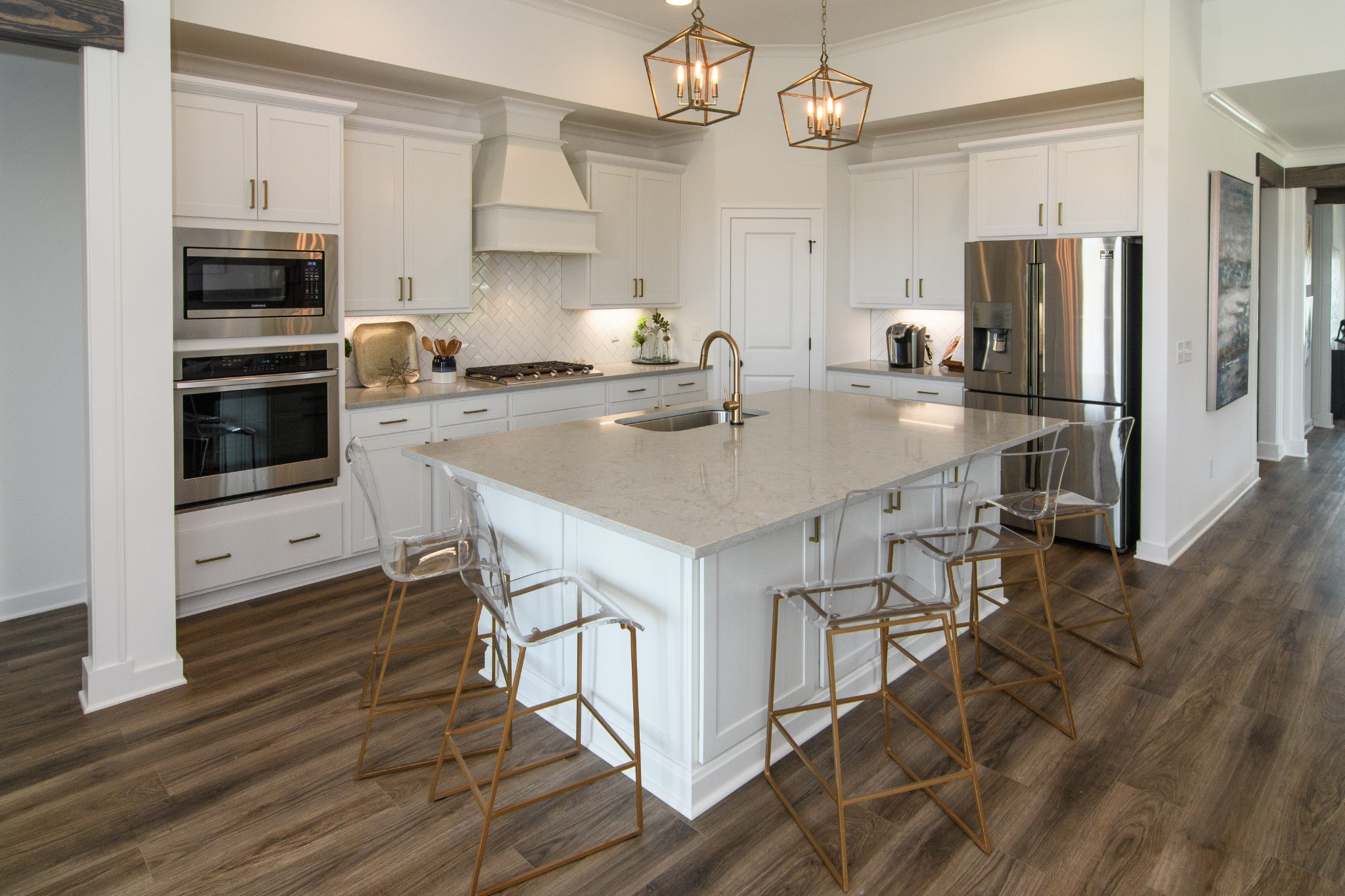 892 Plowson Road Mount Juliet, TN 37122 - Photo 13 of 39 a kitchen with kitchen island a sink appliances and cabinets