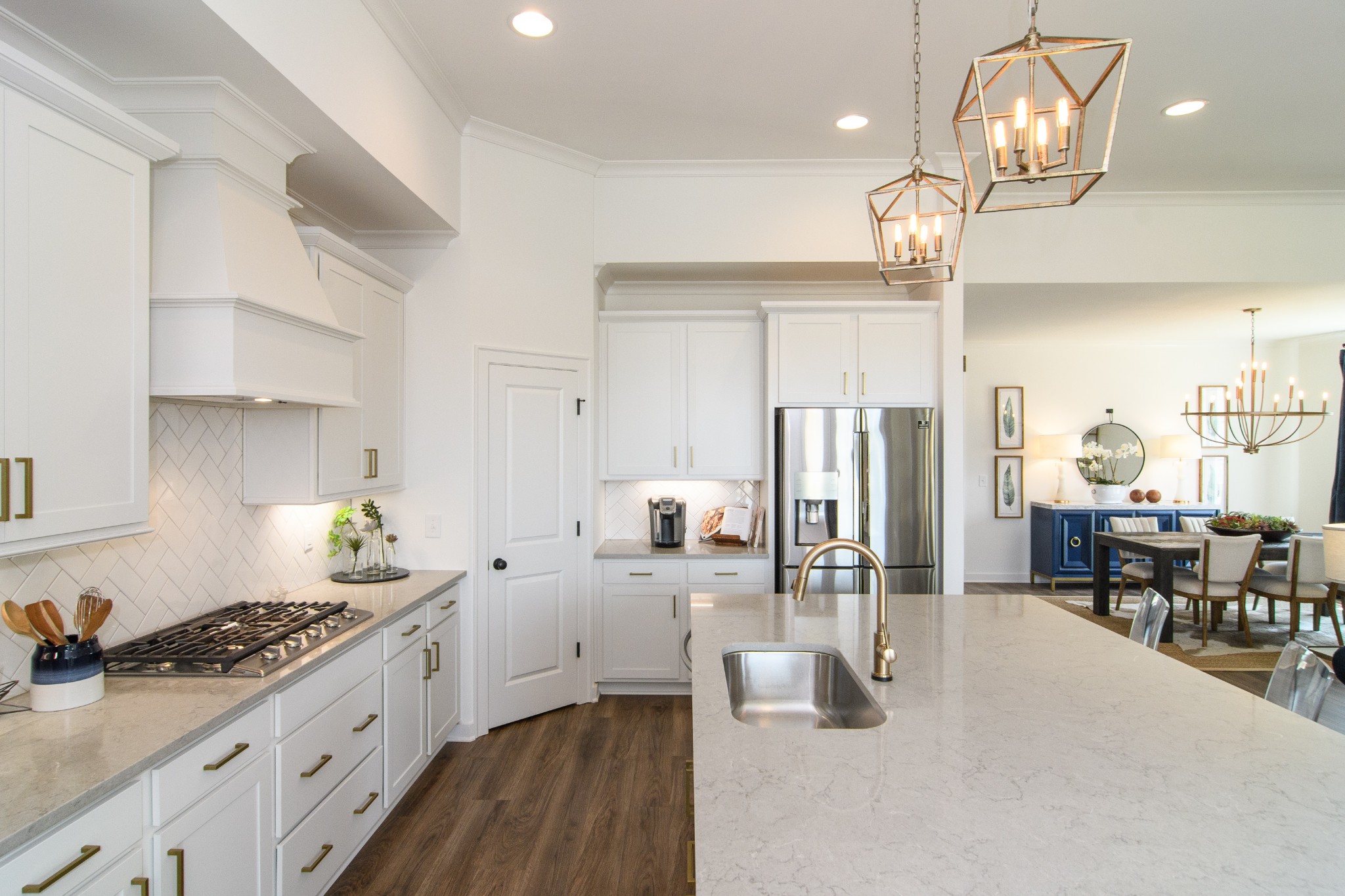 892 Plowson Road Mount Juliet, TN 37122 - Photo 15 of 39 a kitchen with stainless steel appliances granite countertop a stove refrigerator and cabinets