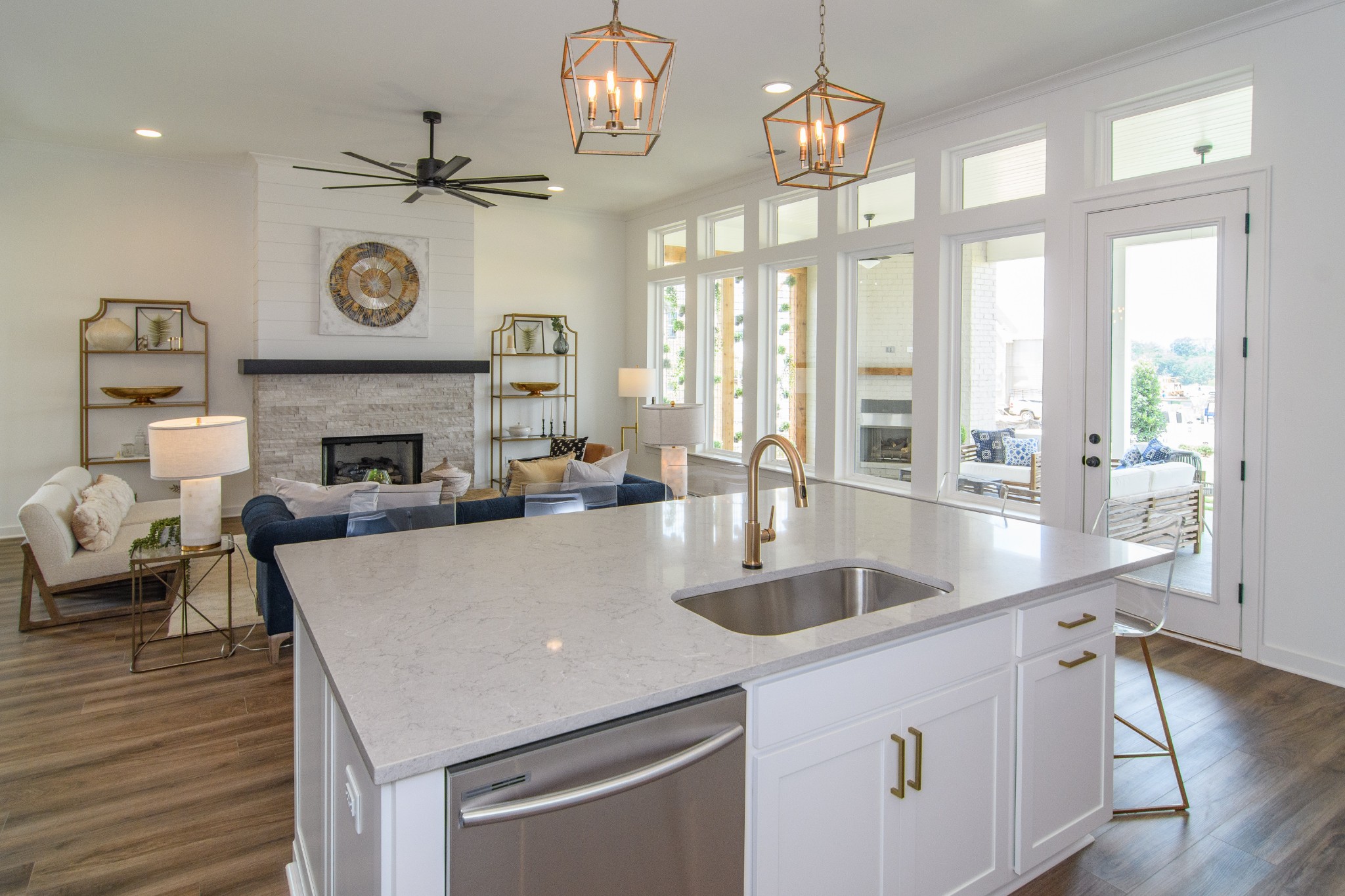 892 Plowson Road Mount Juliet, TN 37122 - Photo 16 of 39 a kitchen with a table chairs and a chandelier