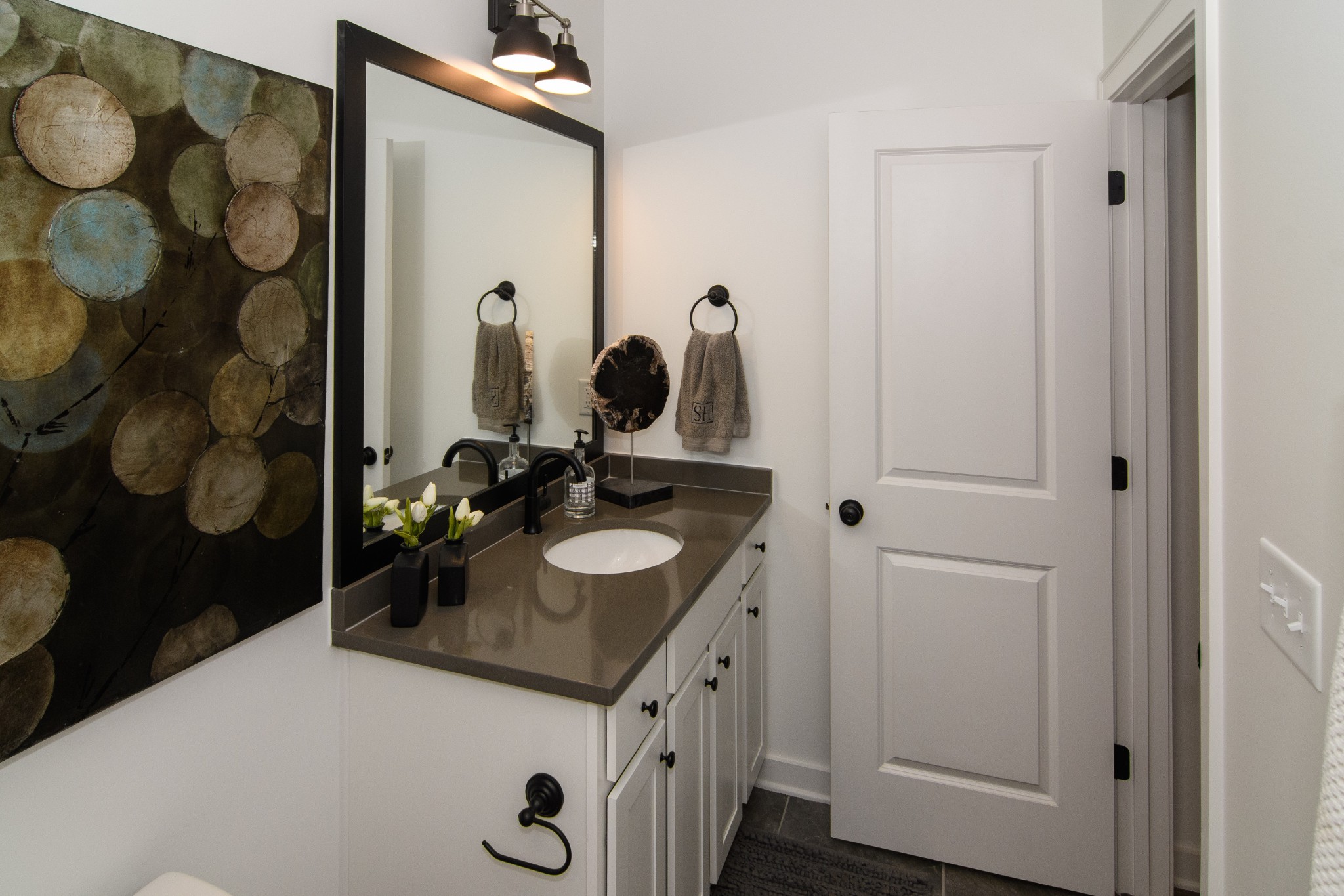892 Plowson Road Mount Juliet, TN 37122 - Photo 22 of 39 a bathroom with a sink and a mirror