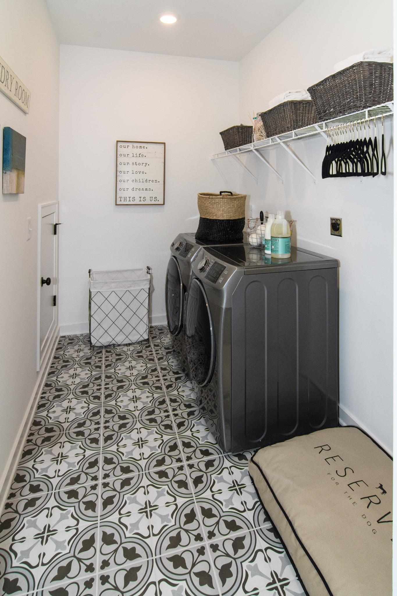 892 Plowson Road Mount Juliet, TN 37122 - Photo 23 of 39 a bedroom with a bed and wooden floor