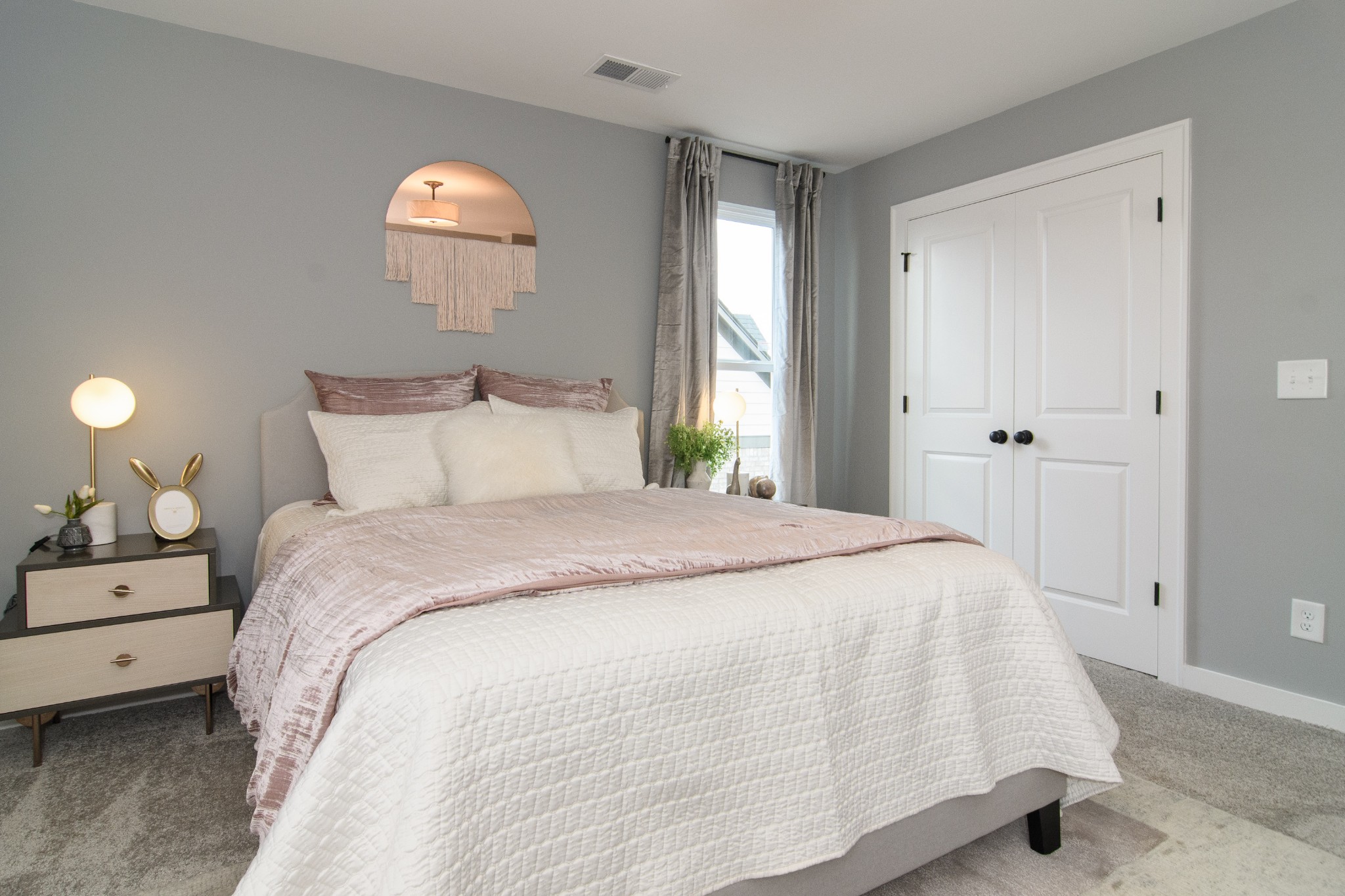 892 Plowson Road Mount Juliet, TN 37122 - Photo 31 of 39 a bedroom with bed and a window