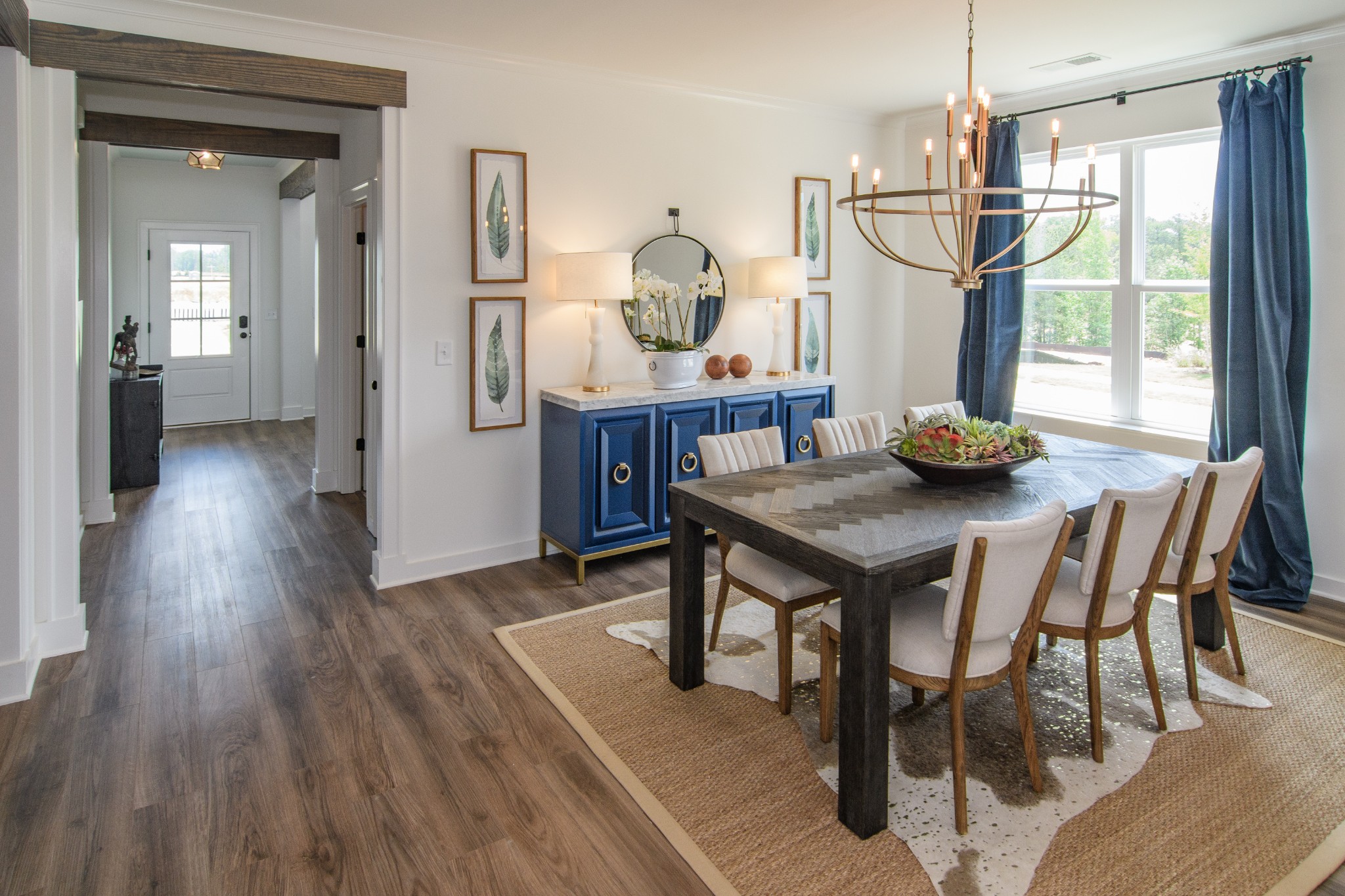 892 Plowson Road Mount Juliet, TN 37122 - Photo 7 of 39 a view of a dining room with furniture window and wooden floor