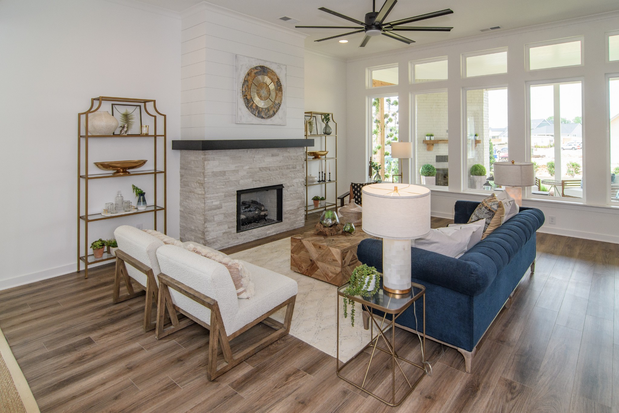 892 Plowson Road Mount Juliet, TN 37122 - Photo 10 of 39 a living room with furniture and a fireplace