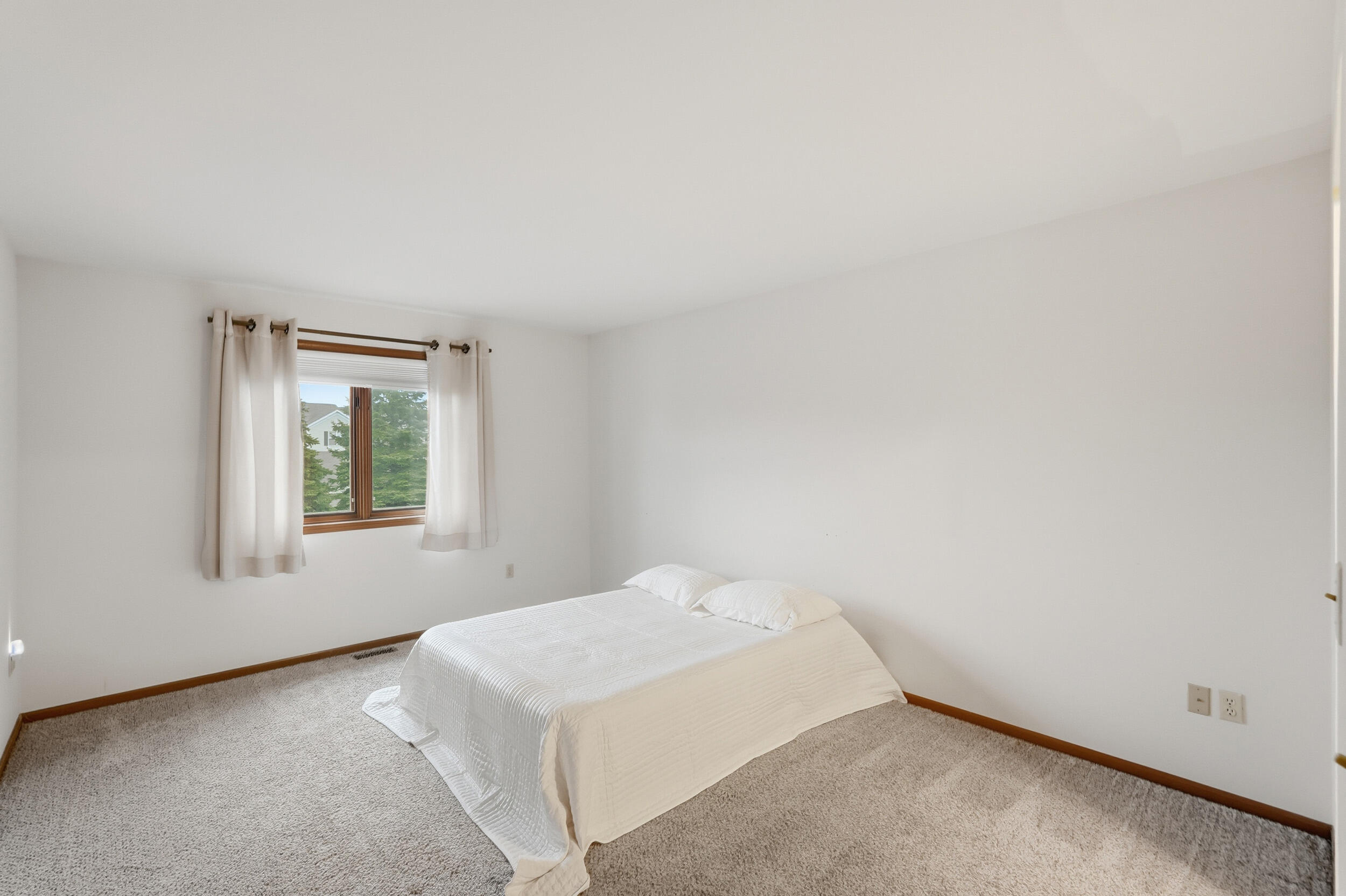 9465 Van Buren Court Crown Point, IN 46307 - Photo 13 of 16 a view of an empty room with a window