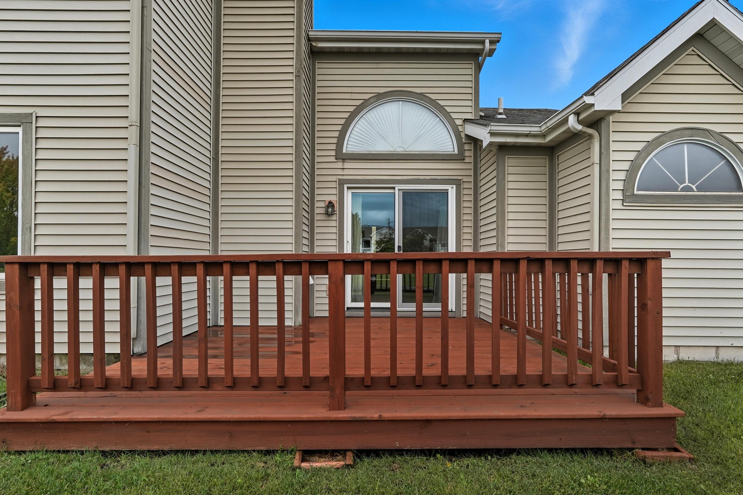 9465 Van Buren Court Crown Point, IN 46307 - Photo 16 of 16 a view of a house with a small yard