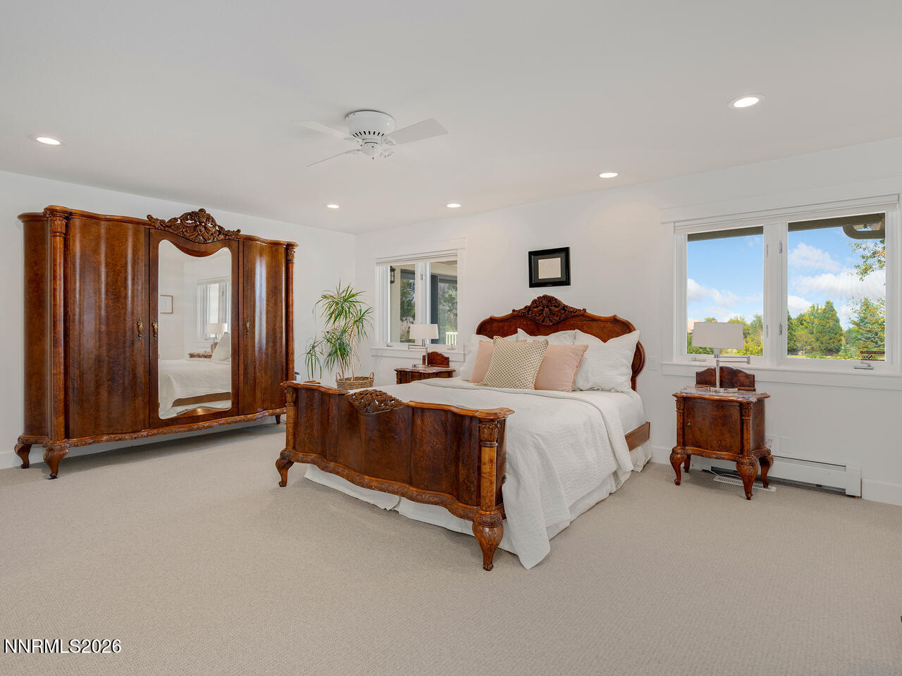 1965 Palmira Drive Reno, NV 89511 - Photo 18 of 63 a spacious bedroom with a bed and a window