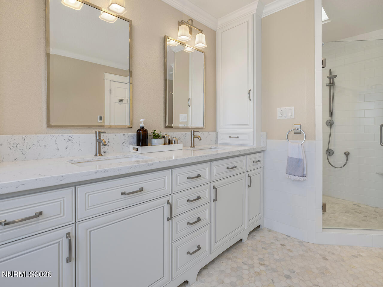 1965 Palmira Drive Reno, NV 89511 - Photo 20 of 63 a bathroom with double vanity sink two mirror and a shower
