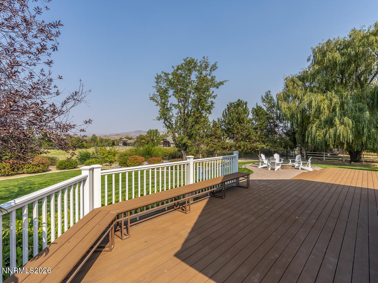 1965 Palmira Drive Reno, NV 89511 - Photo 44 of 63 a view of a balcony with wooden floor and fence