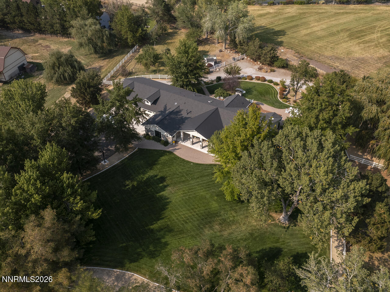 1965 Palmira Drive Reno, NV 89511 - Photo 57 of 63 an aerial view of residential houses with outdoor space and trees