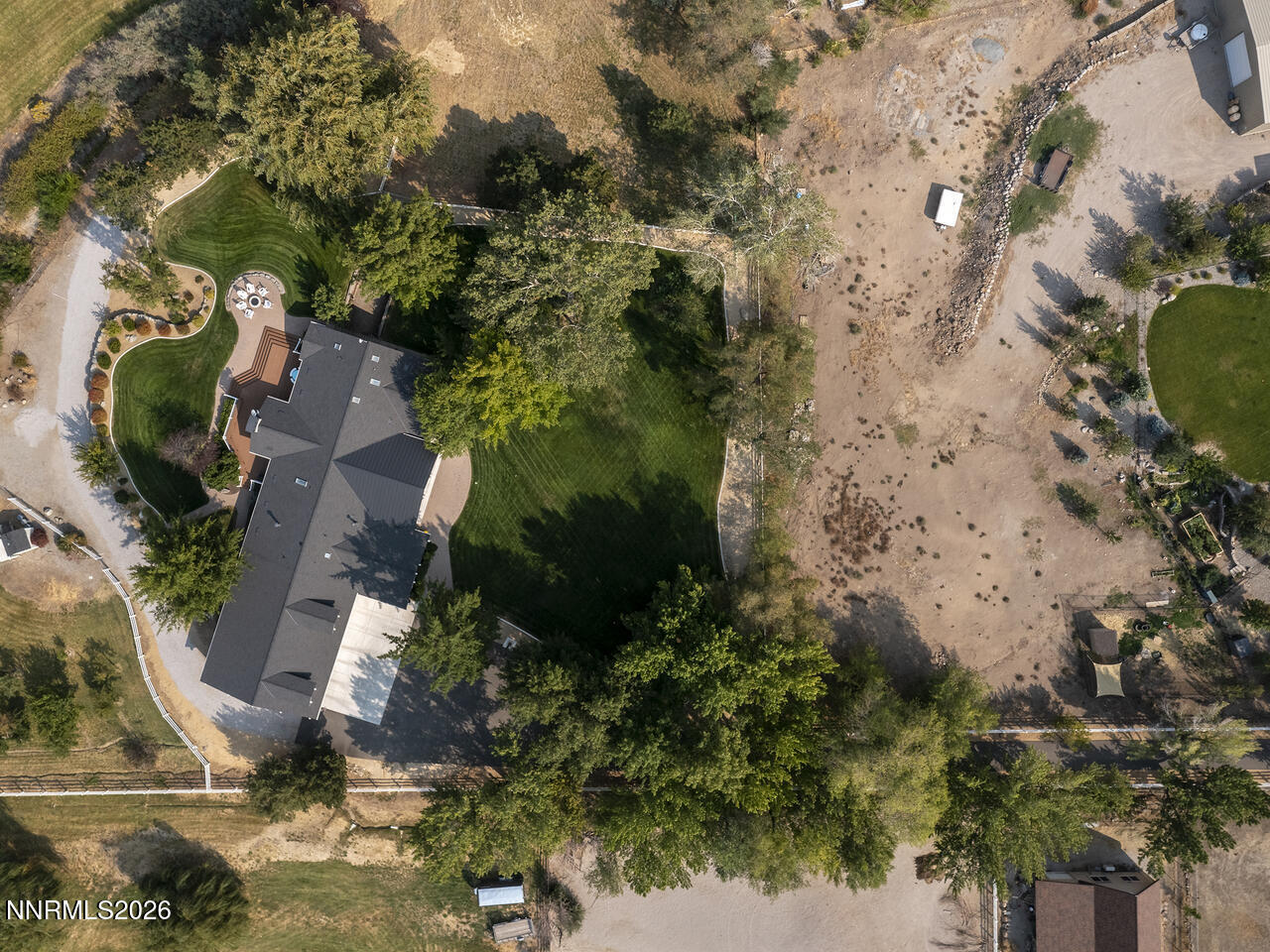 1965 Palmira Drive Reno, NV 89511 - Photo 59 of 63 an aerial view of a house with a yard