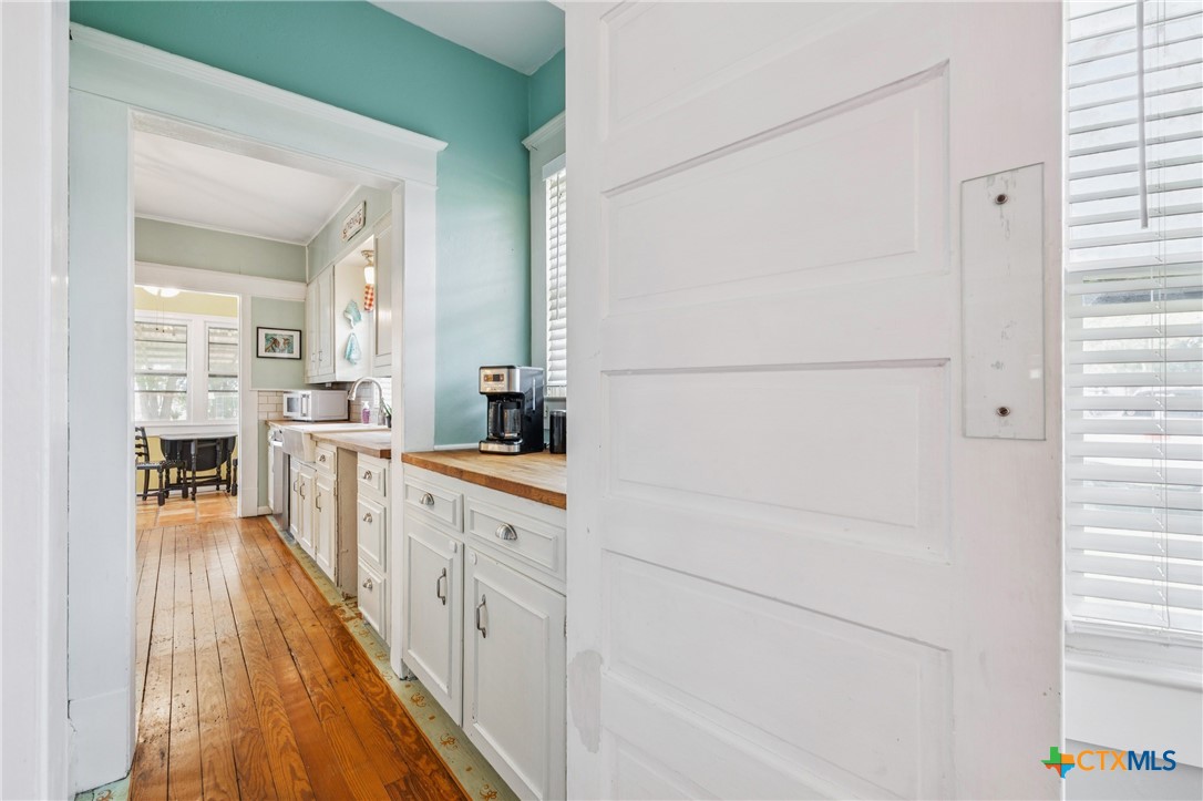 1004 Mitchell Street Gonzales, TX 78629 - Photo 11 of 46 a kitchen with stainless steel appliances a refrigerator and a stove