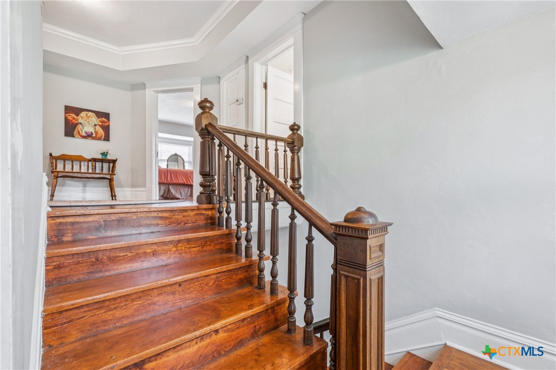 1004 Mitchell Street Gonzales, TX 78629 - Photo 25 of 46 a view of entryway and hall with wooden floor