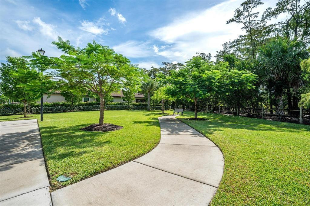 9208 Passiflora Way, Unit 102 Boca Raton, FL 33428 - Photo 5 of 30 a view of a park with tree s