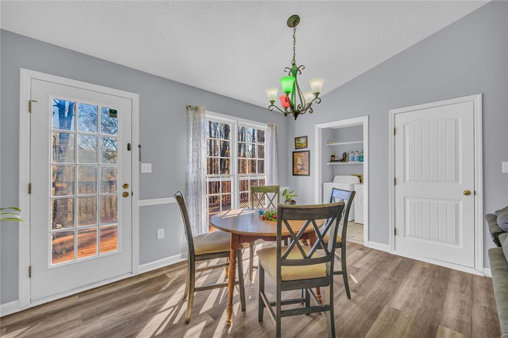 375 Brookstone Drive Athens, GA 30605 - Photo 11 of 70 a view of a dining room with furniture and a window