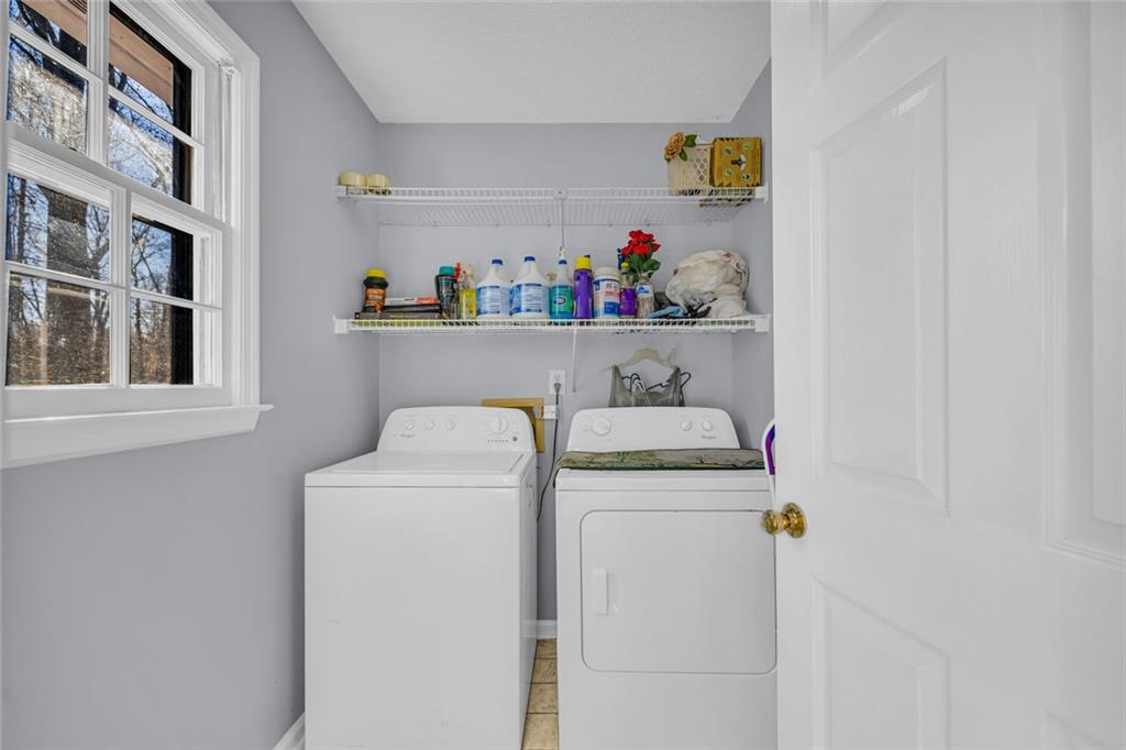 375 Brookstone Drive Athens, GA 30605 - Photo 19 of 70 a utility room with dryer and washer