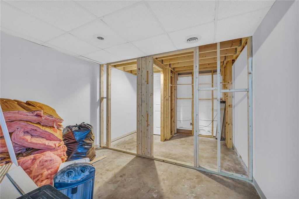 375 Brookstone Drive Athens, GA 30605 - Photo 26 of 70 a view of walk in closet with clothes and shoes