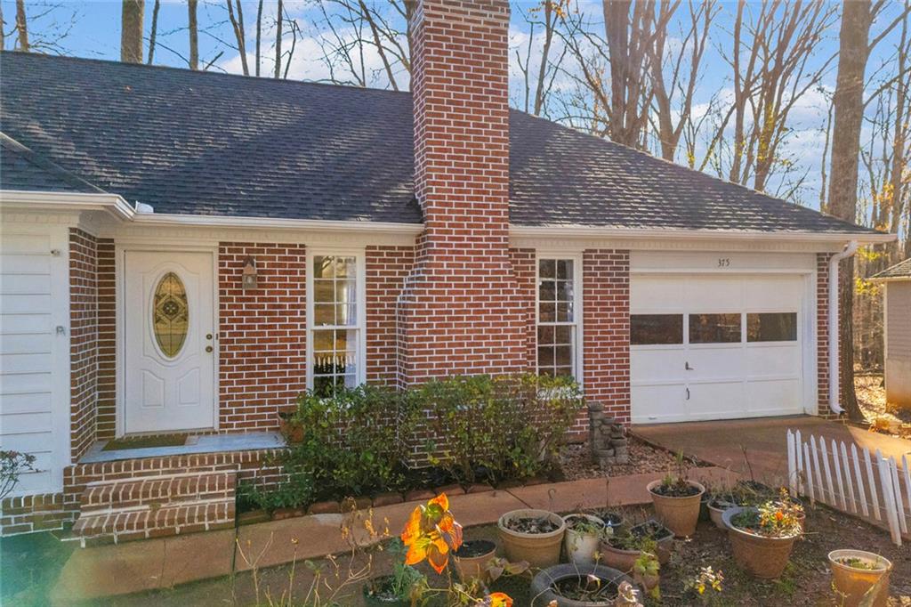 375 Brookstone Drive Athens, GA 30605 - Photo 32 of 70 a front view of a house with a yard