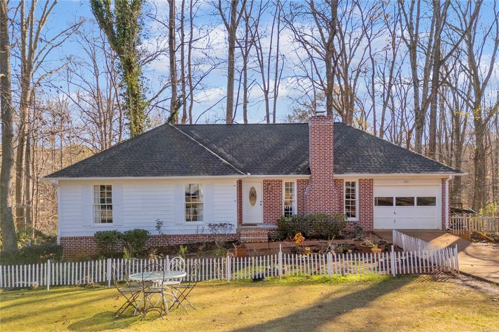 375 Brookstone Drive Athens, GA 30605 - Photo 45 of 70 a view of a house with swimming pool and sitting area