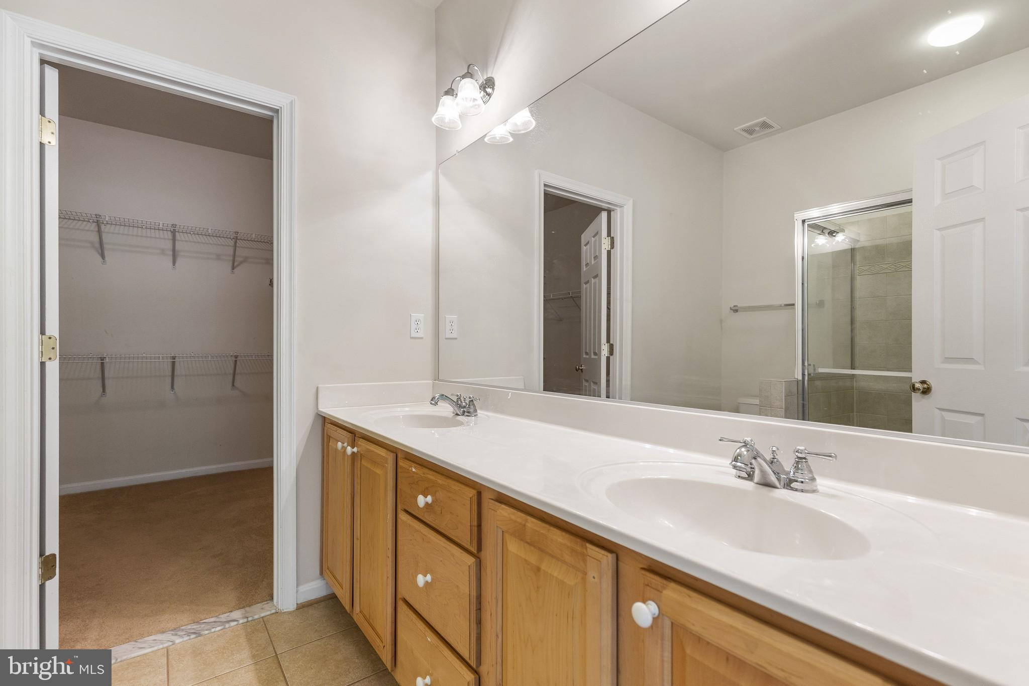 674 Ruxton Road, Unit 63 Solomons, MD 20629 - Photo 15 of 32 Owner's bath, large closet.