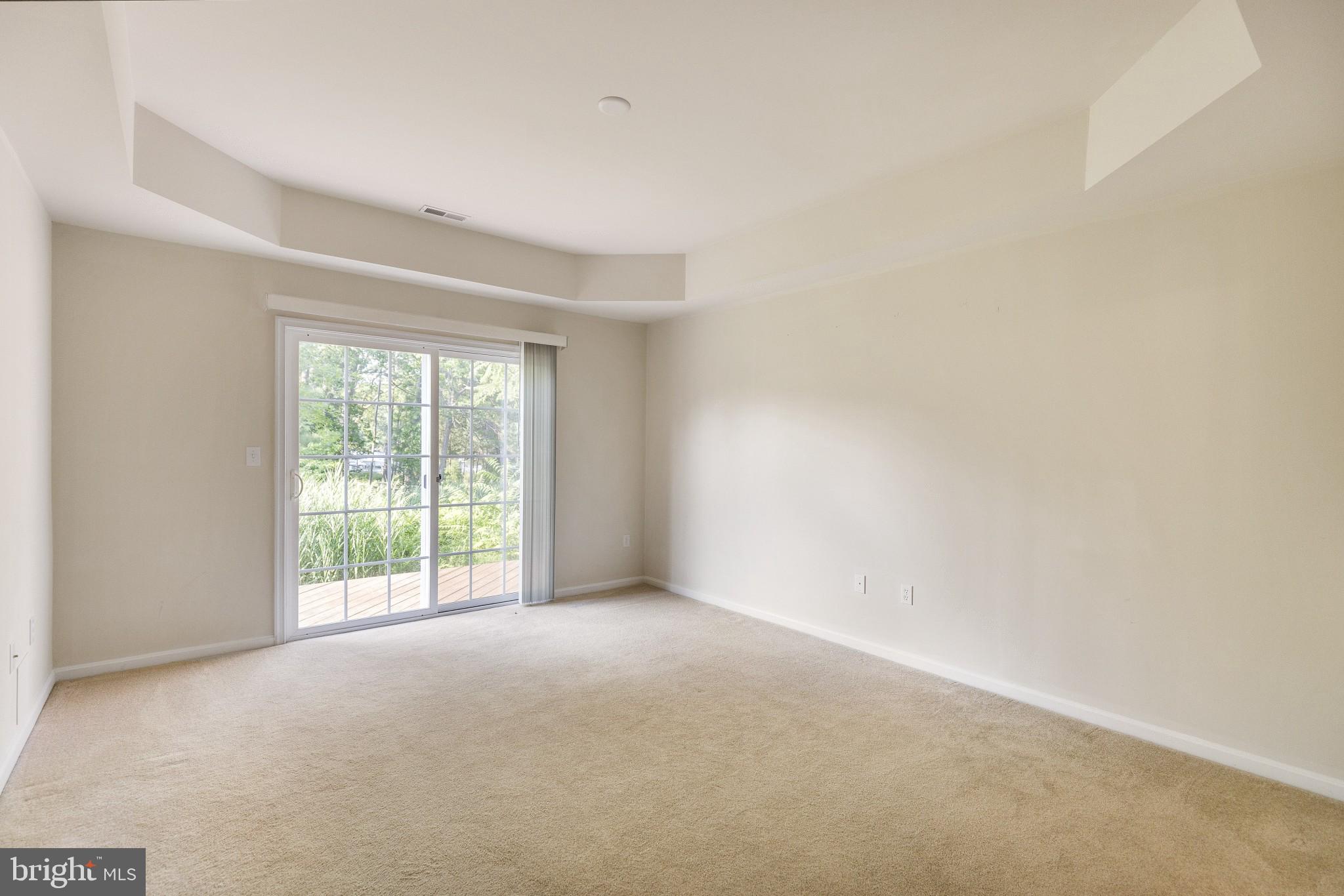 674 Ruxton Road, Unit 63 Solomons, MD 20629 - Photo 16 of 32 Owner's suite to deck.