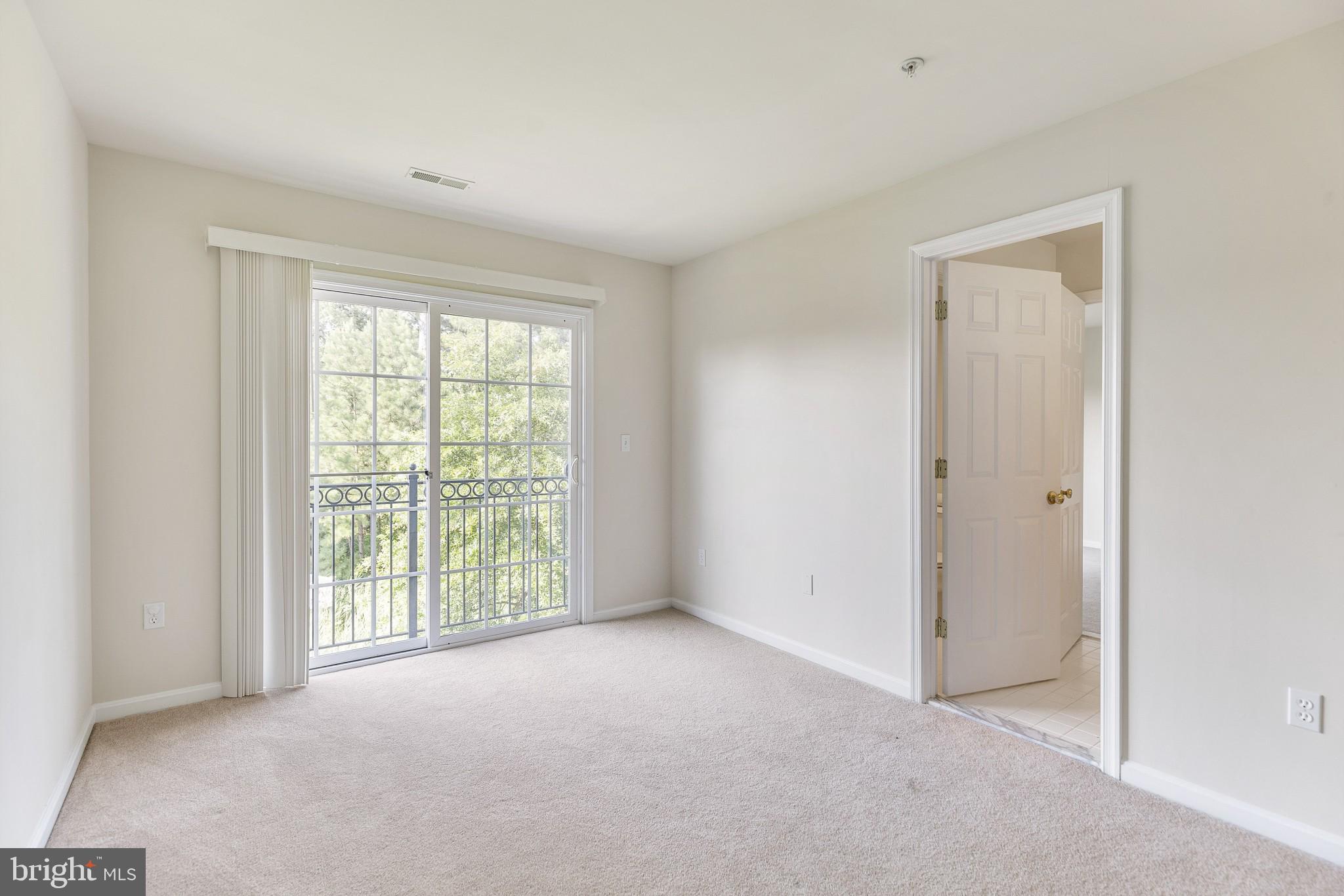 674 Ruxton Road, Unit 63 Solomons, MD 20629 - Photo 21 of 32 Upper level bedroom 2 with connecting bath.