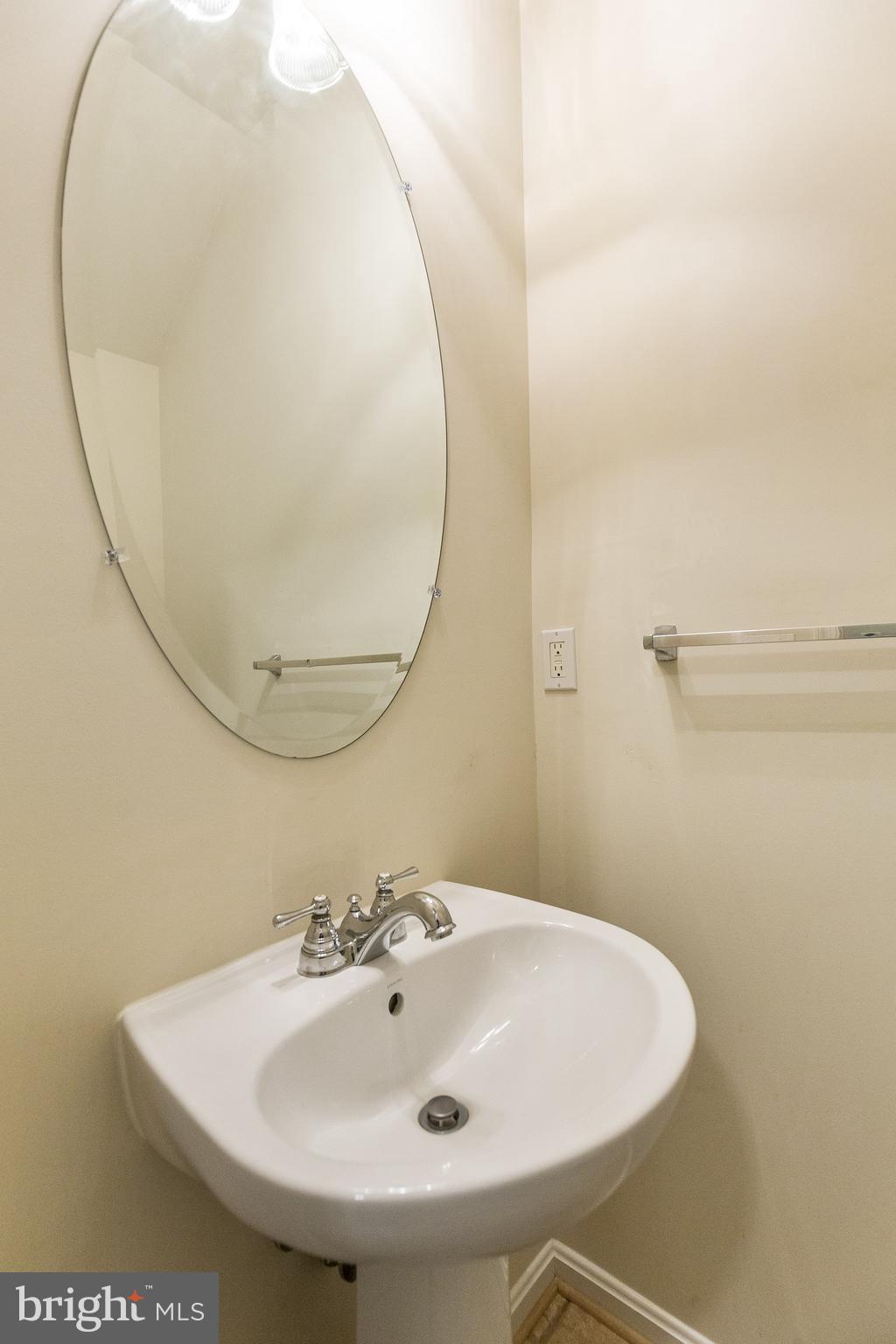 674 Ruxton Road, Unit 63 Solomons, MD 20629 - Photo 29 of 32 Half bath main level.